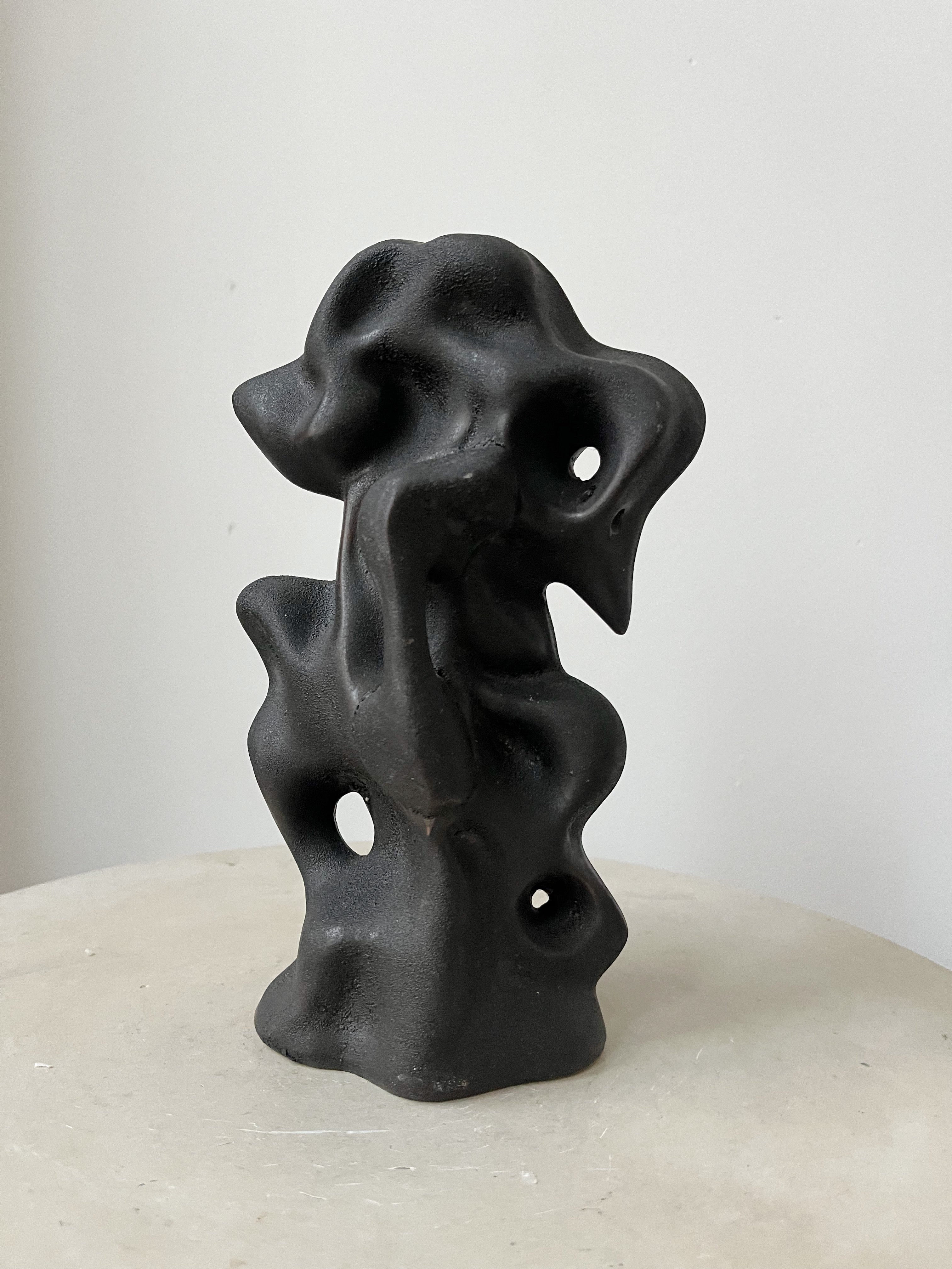 BLACK CERAMIC STATUE