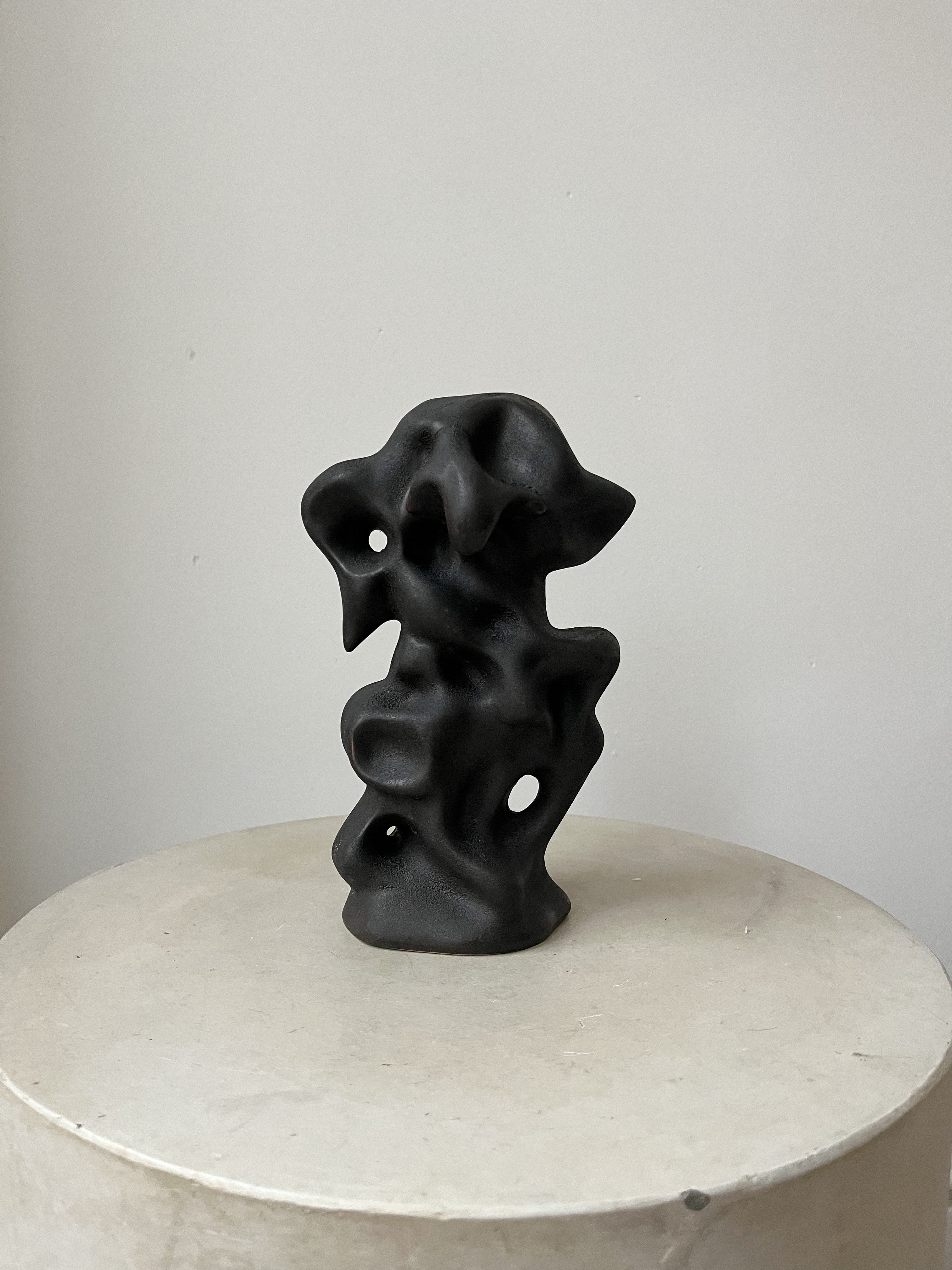 BLACK CERAMIC STATUE