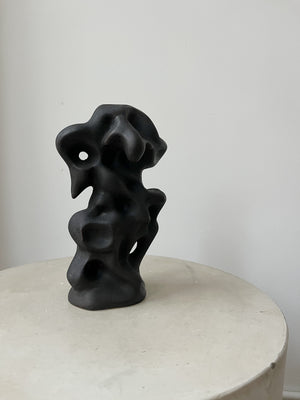 BLACK CERAMIC STATUE