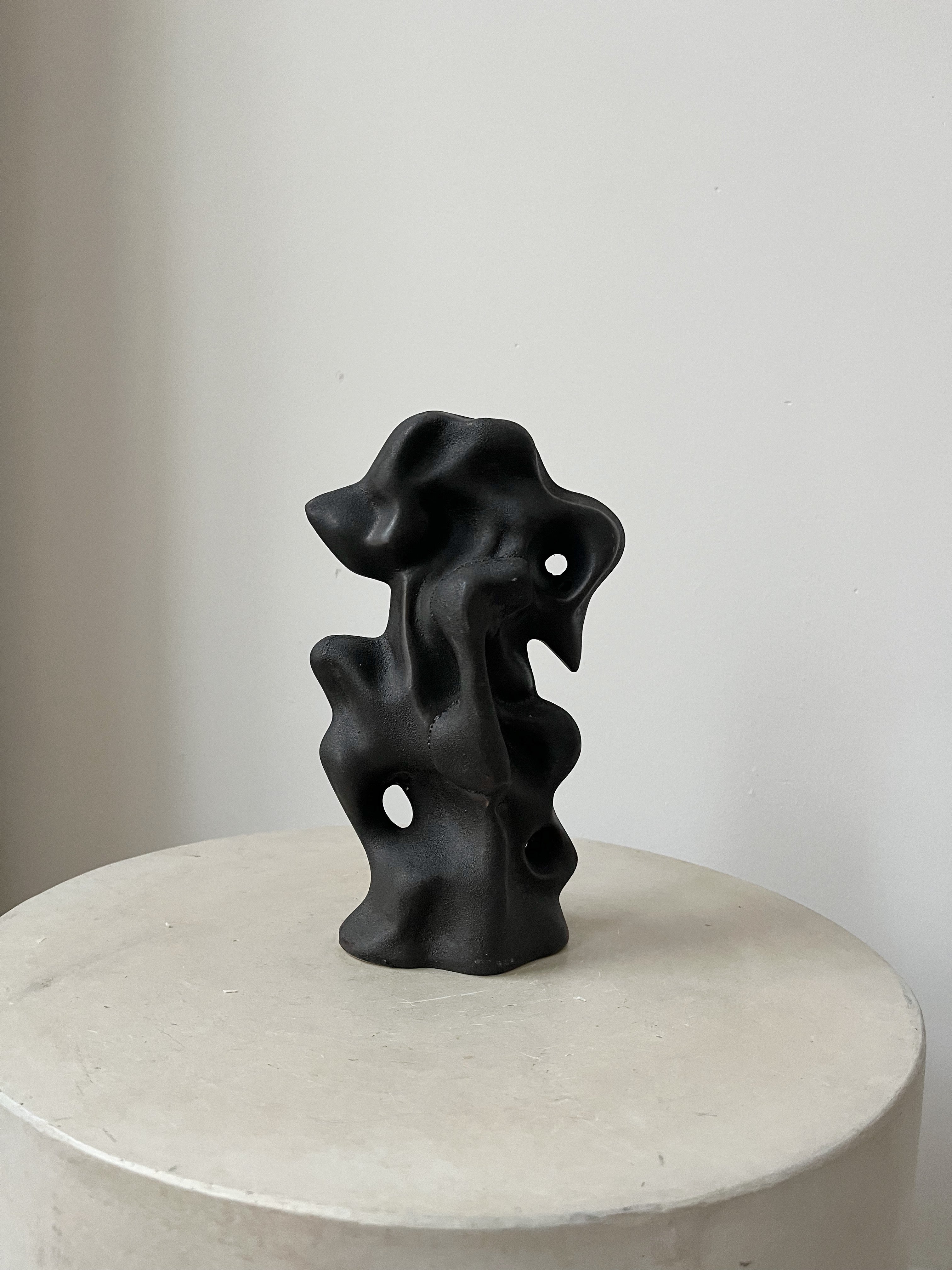 BLACK CERAMIC STATUE