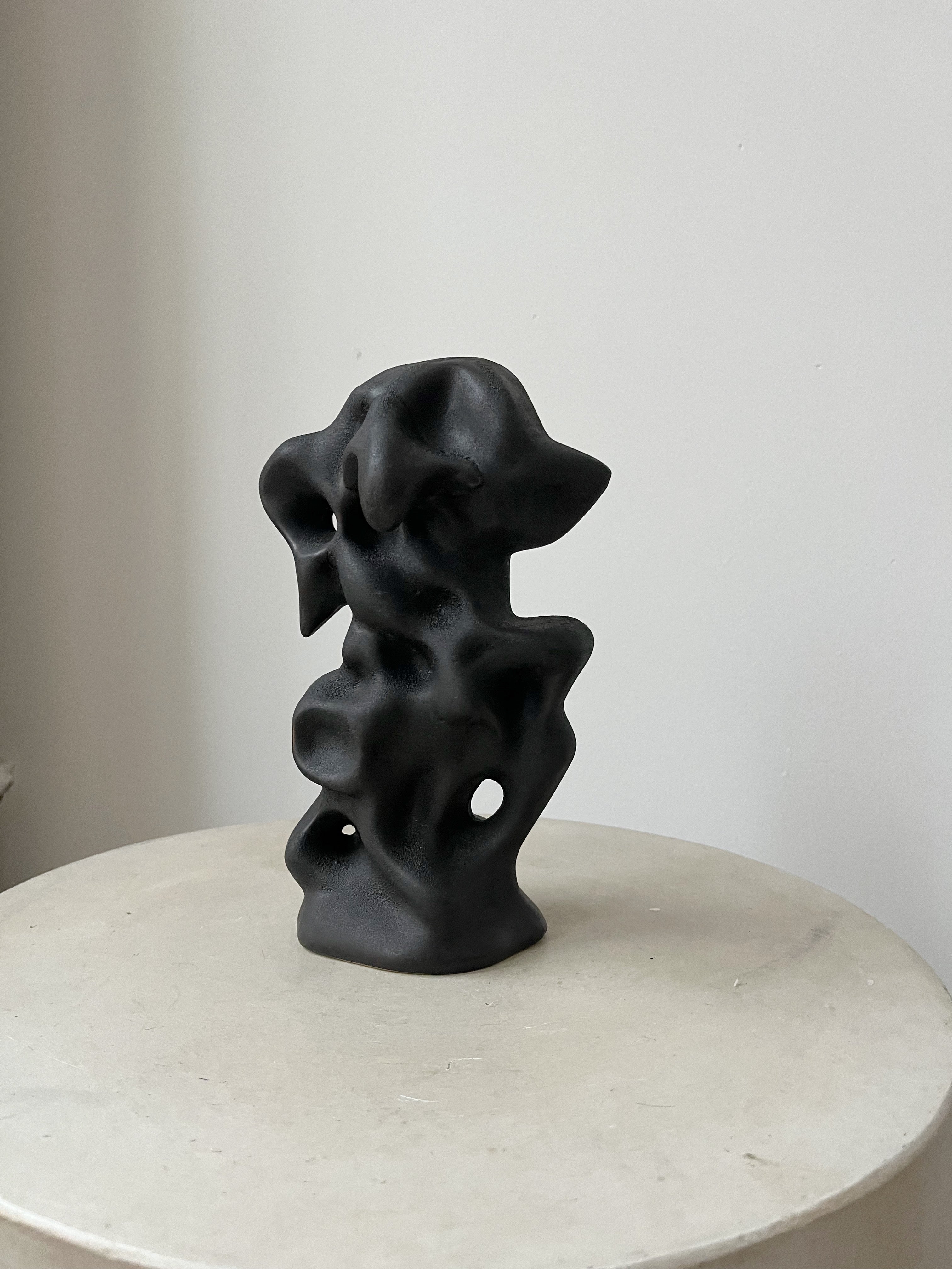 BLACK CERAMIC STATUE